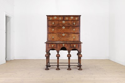 Lot 355 - A William and Mary walnut and feather-banded chest on stand