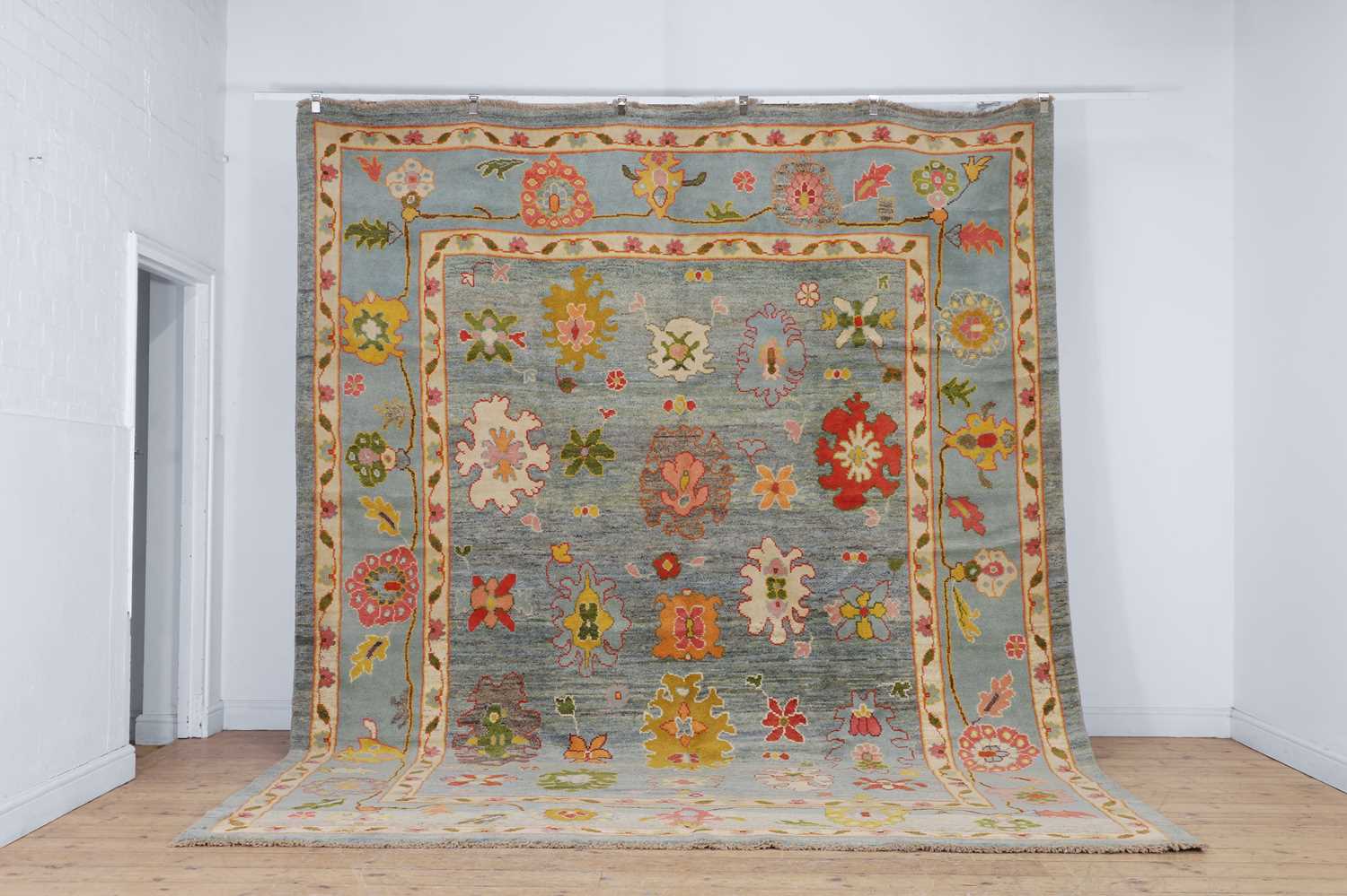 Lot 508 - An Oushak wool carpet