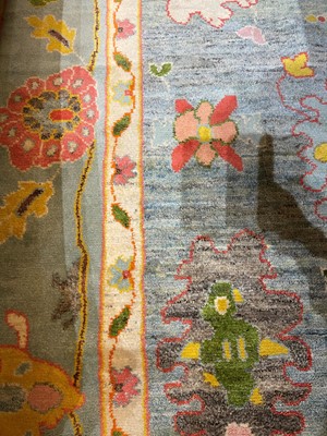 Lot 508 - An Oushak wool carpet