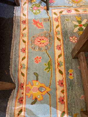 Lot 508 - An Oushak wool carpet