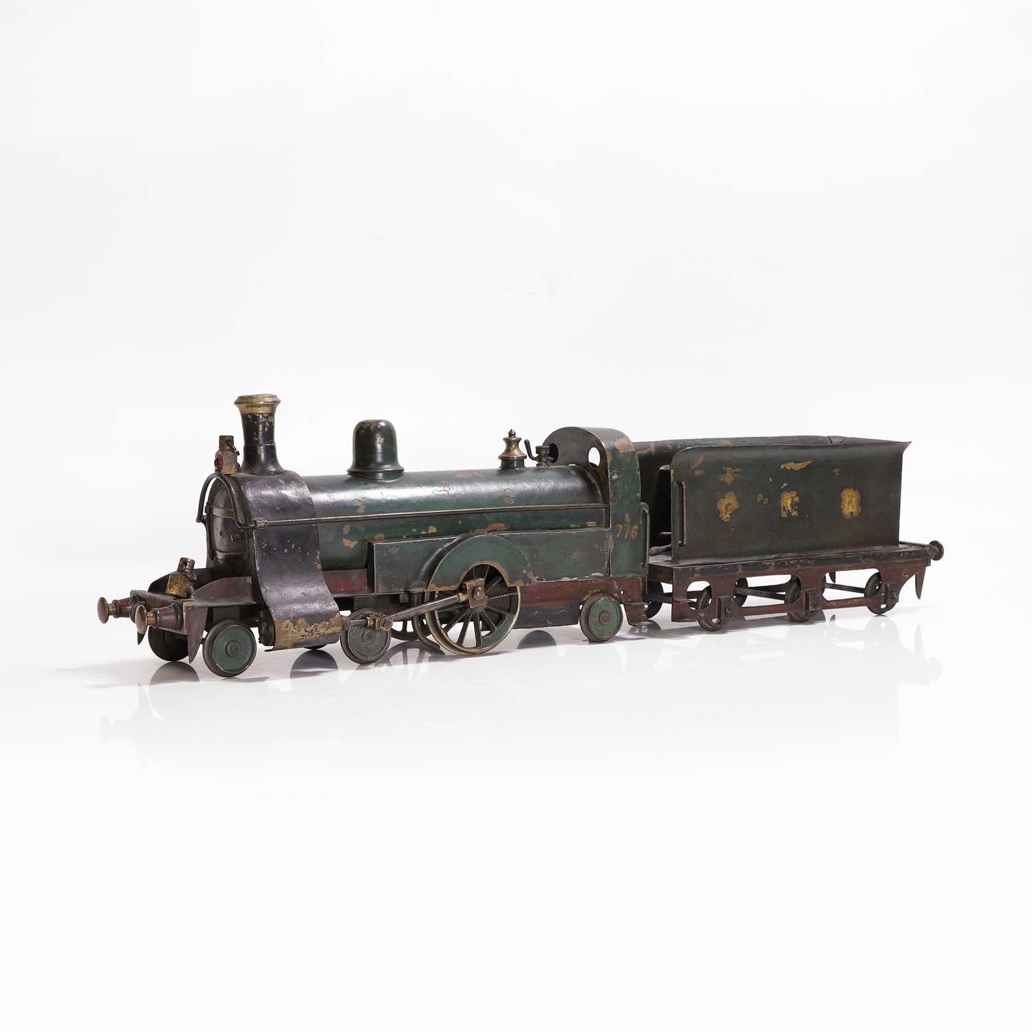 Lot 299 - A 3-inch gauge tinplate live steam 4-2-2 locomotive and tender