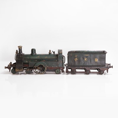 Lot 299 - A 3-inch gauge tinplate live steam 4-2-2 locomotive and tender