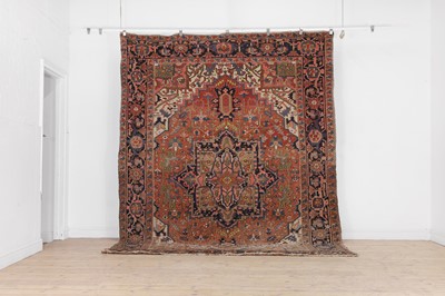 Lot 291 - A Persian Heriz wool carpet