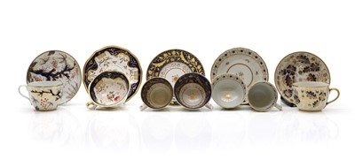 Lot 221 - A group of thirteen cups, ten saucers and a tea plate