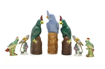 Lot 256 - A collection of Chinese style pottery parrots