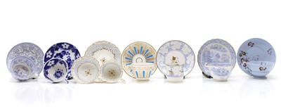 Lot 212 - A collection of porcelain teacups and saucers