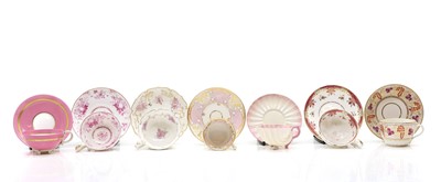 Lot 220 - A collection of twelve porcelain cups and saucers