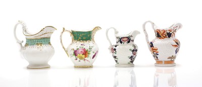 Lot 202 - A collection of eight cream jugs