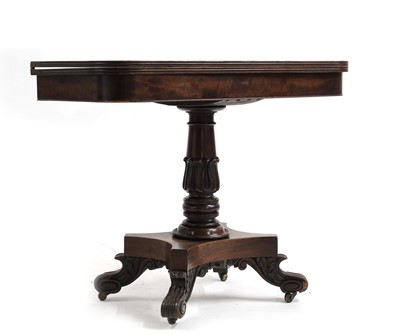 Lot 534 - A mahogany tea table