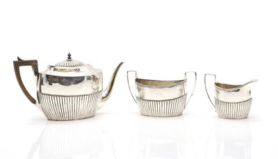 Lot 15 - A three piece silver tea service