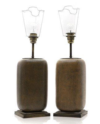 Lot 353 - A pair of earthenware lamps