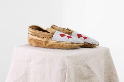 Lot 306 - A pair of Native American beaded hide moccasins