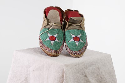 Lot 297 - A pair of Native American beaded hide moccasins