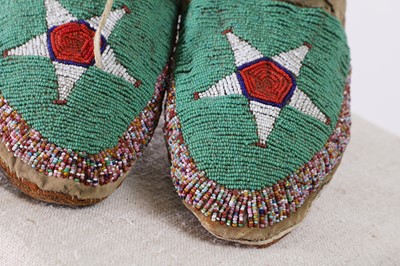 Lot 297 - A pair of Native American beaded hide moccasins