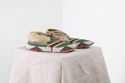 Lot 337 - A pair of Native American beaded hide moccasins