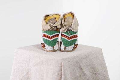 Lot 337 - A pair of Native American beaded hide moccasins