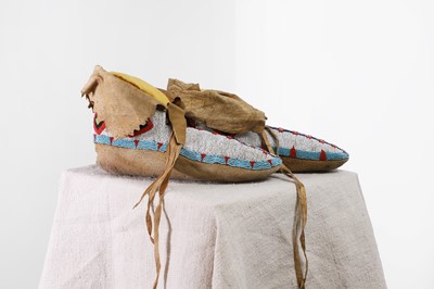 Lot 351 - A pair of Native American beaded hide moccasins