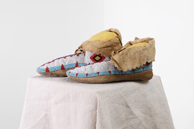 Lot 351 - A pair of Native American beaded hide moccasins