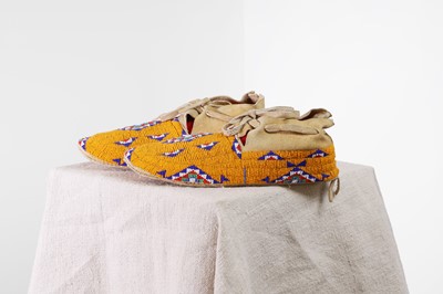 Lot 341 - A pair of Native American beaded hide moccasins