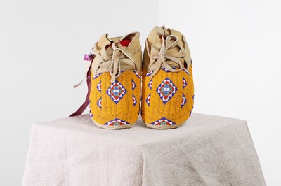 Lot 341 - A pair of Native American beaded hide moccasins