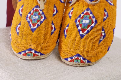 Lot 341 - A pair of Native American beaded hide moccasins