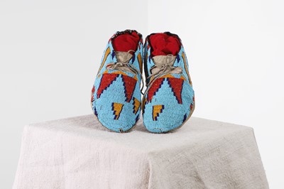 Lot 334 - A pair of Native American beaded hide moccasins