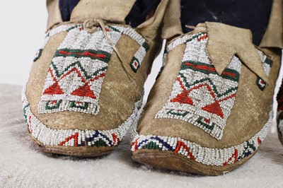 Lot 302 - Two pairs of Native American beaded hide moccasins