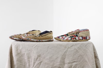 Lot 302 - Two pairs of Native American beaded hide moccasins