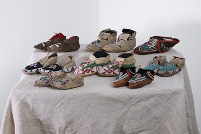 Lot 342 - A collection of Native American children's beaded hide moccasins