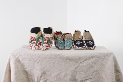 Lot 342 - A collection of Native American children's beaded hide moccasins