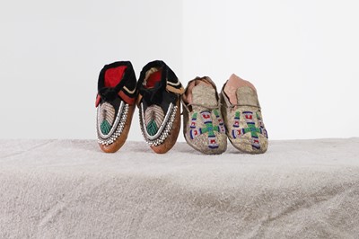 Lot 342 - A collection of Native American children's beaded hide moccasins