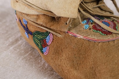 Lot 366 - Two pairs of Native American beaded hide moccasins