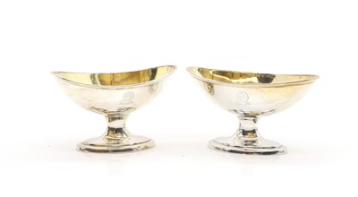 Lot 27 - A pair of George III silver pedestal salts