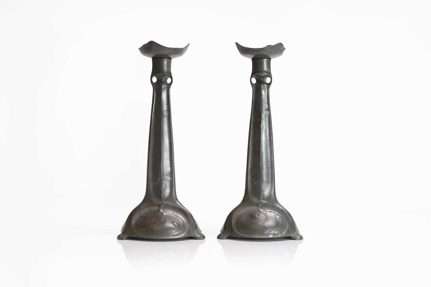 Lot 73 - A pair of Kayserzinn cast pewter candlesticks