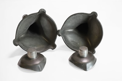 Lot 73 - A pair of Kayserzinn cast pewter candlesticks