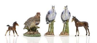 Lot 82 - A group of three Mauri bisque porcelain figurines