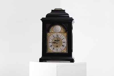 Lot 558 - A George II ebonised table clock