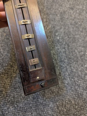 Lot 225 - A rosewood stick clock