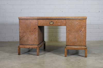 Lot 111 - An Art Deco oak desk