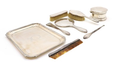 Lot 21 - A silver mounted matched dressing table set