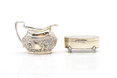 Lot 23 - A silver cream jug