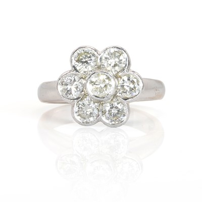 Lot 172 - An 18ct white gold diamond daisy cluster ring