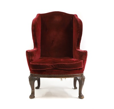 Lot 652 - A Queen Anne-style mahogany wing armchair