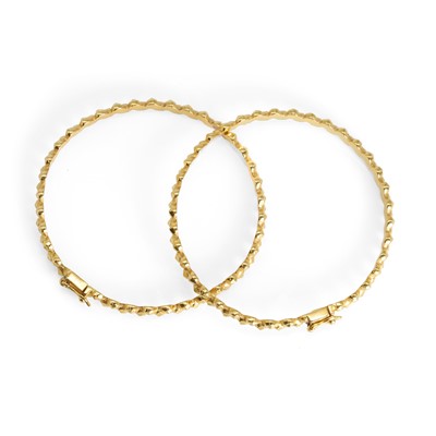 Lot 288 - A set of two gold bangles