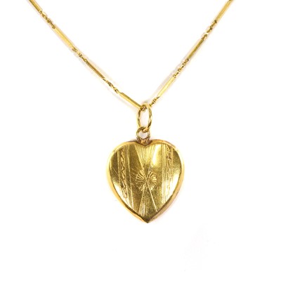 Lot 239 - A heart shaped pendant and chain