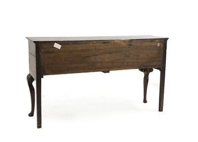 Lot 523 - A George III oak dresser