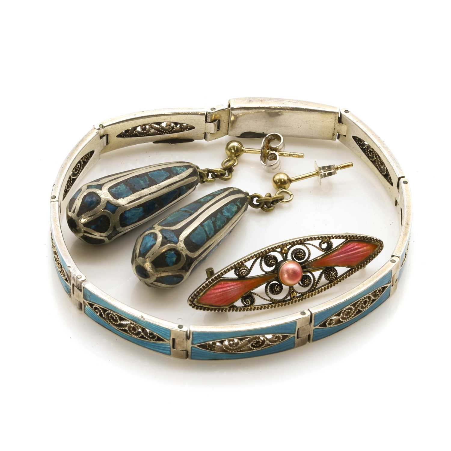 Lot 378 - A silver enamel panel bracelet and brooch, by Marius Hammer
