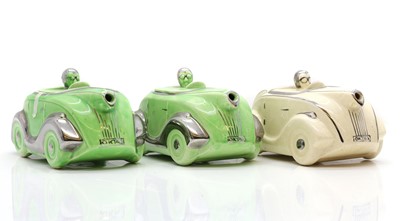 Lot 95 - A group of three James Sadler 'Racing Car' pottery teapots