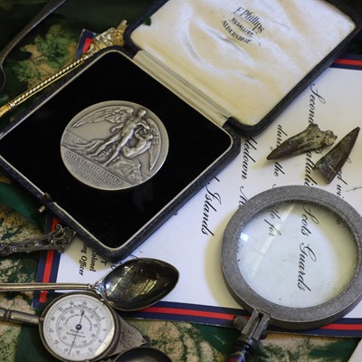 Lot 56 - A table vitrine with contents relating to 1st Viscount Hugh Trenchard