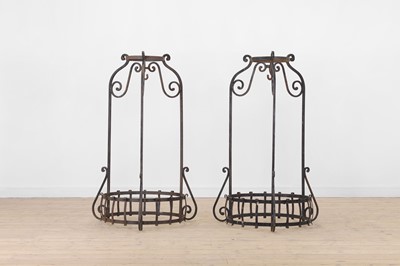 Lot 230 - A pair of wrought-iron jardinière frames